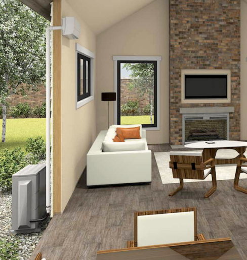 Residential ductless heat pump installation in a modern living room, featuring a white sofa with orange cushions, wooden furniture, and a wall-mounted TV, showcasing energy-efficient HVAC solutions for home comfort.