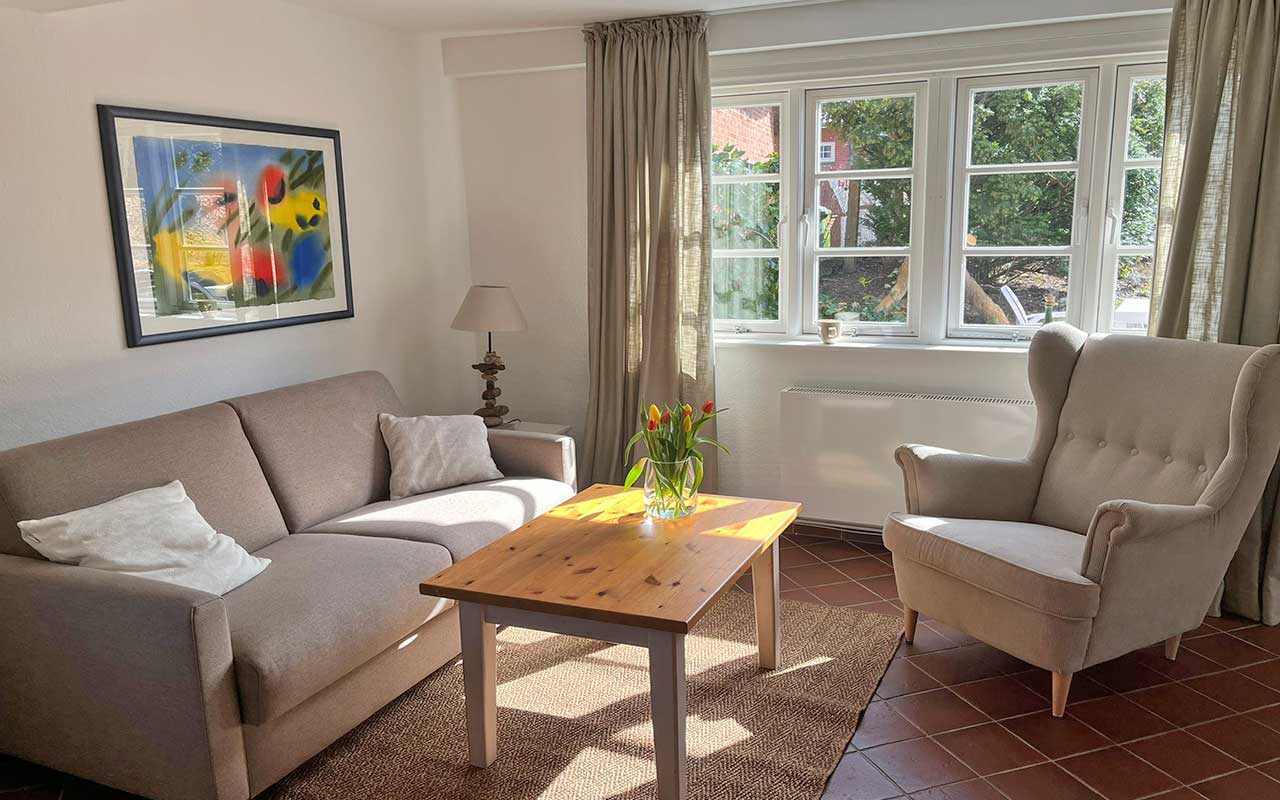 A man sitting in the room in old romantic cottage