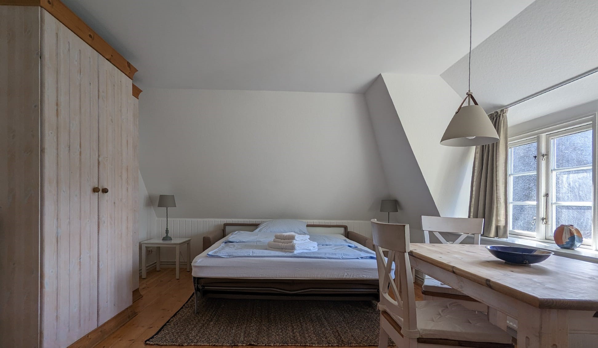A man sitting in the room in old romantic cottage