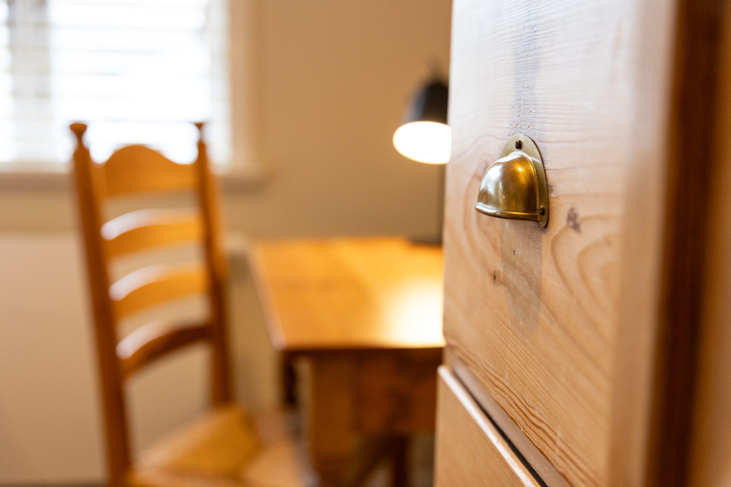 A man sitting in the room in old romantic cottage