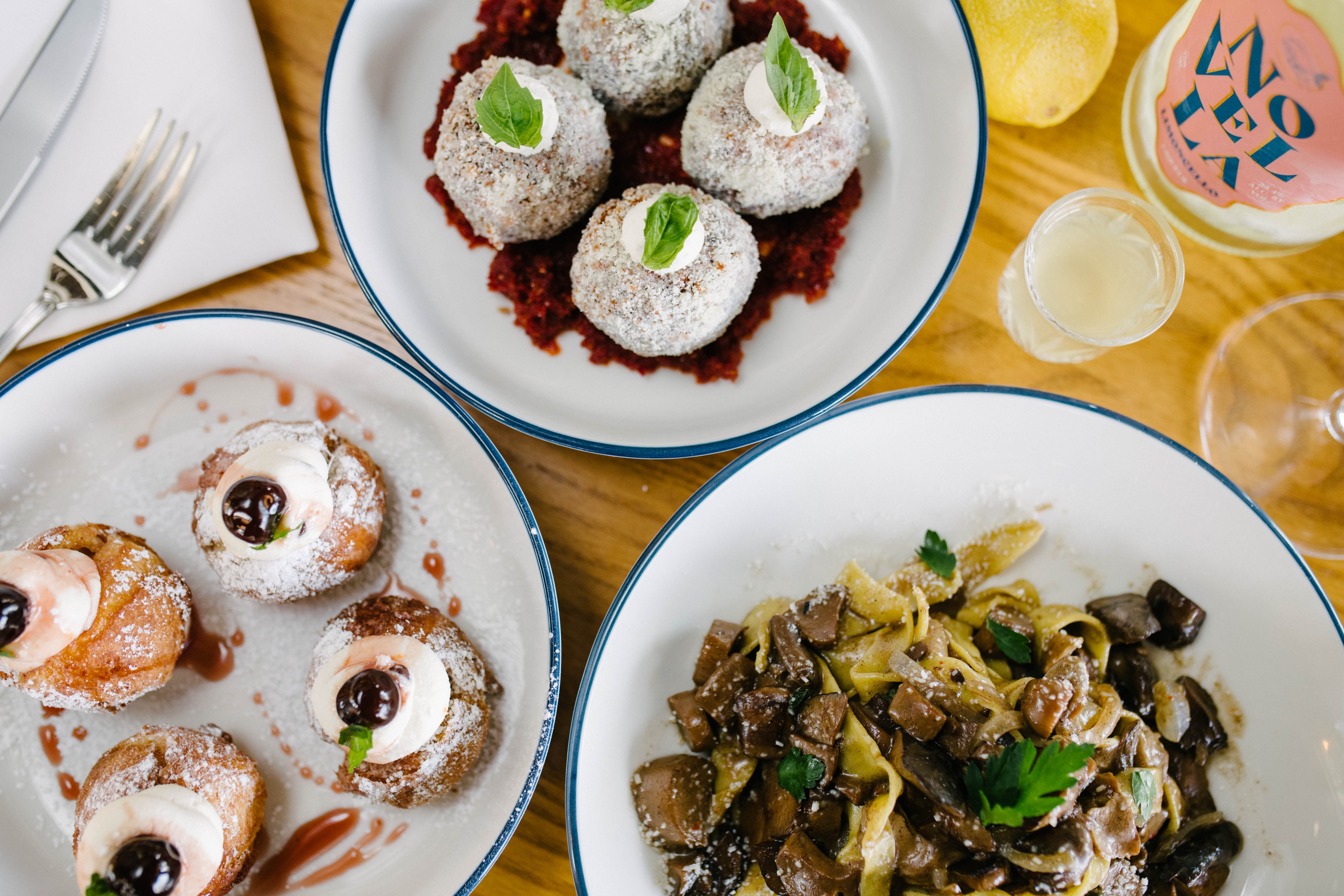 Ricotta fritters plated at Osteria Novella