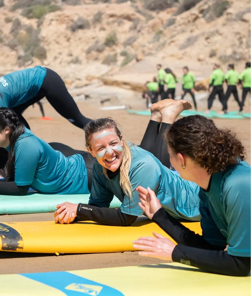 Surf session on Moroccan beach with Salt House Morocco instructors