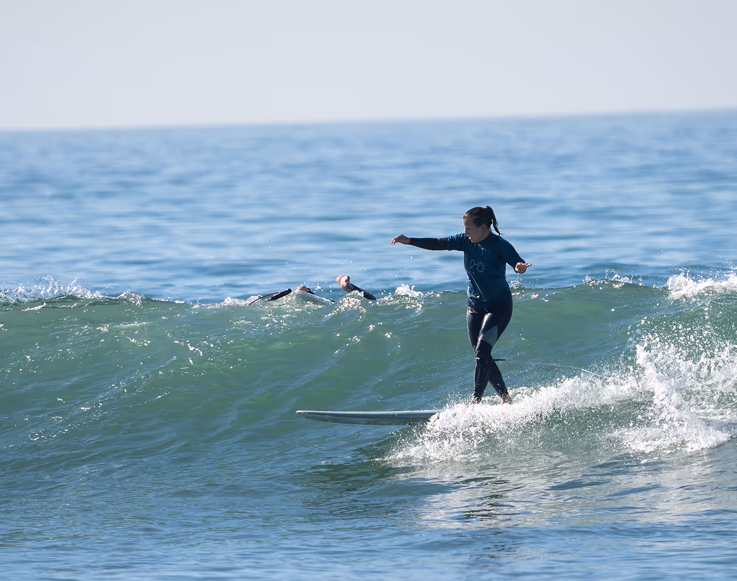 Longboarder girl cross stepping in banana point