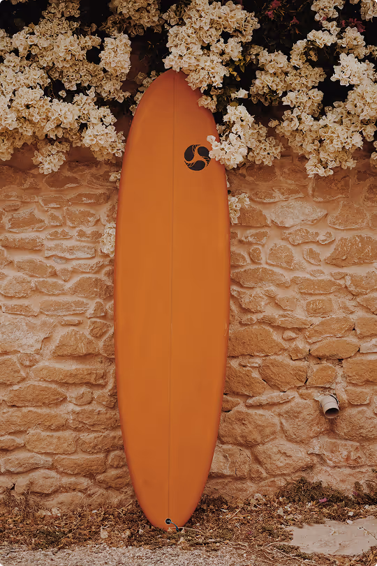 High-performance orange surfboard for advanced surfers in Morocco