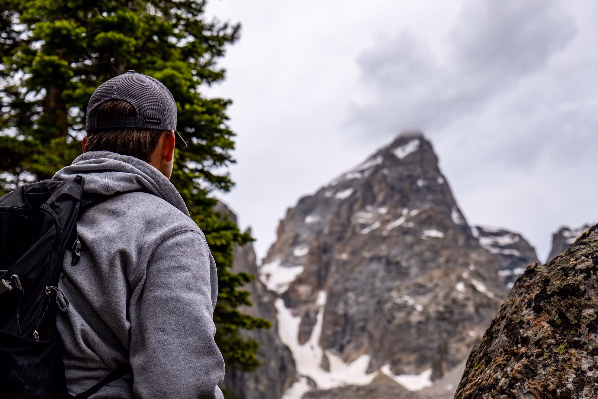 A hiker staring at the Grand Teton