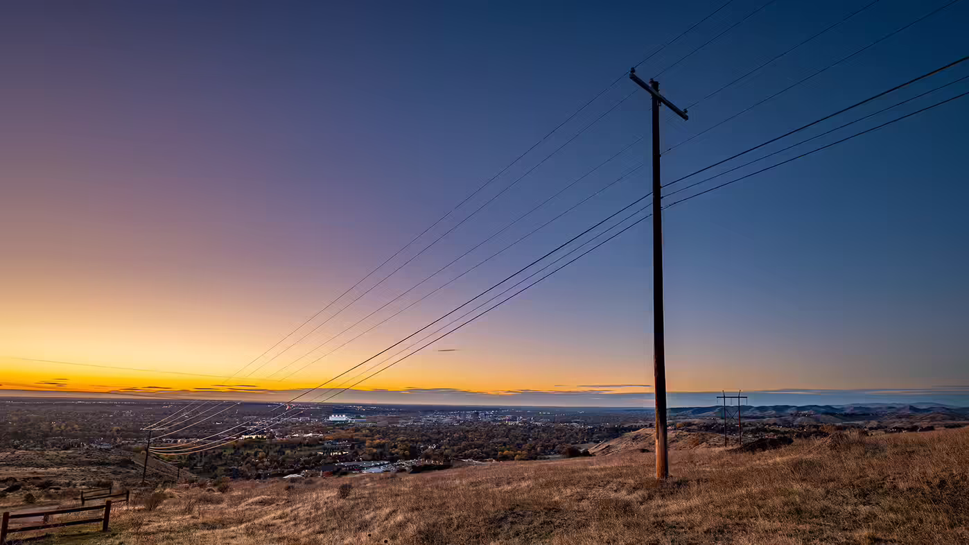 Power pole and utility lines leading into the sunset at Table Rock, Boise, Idaho