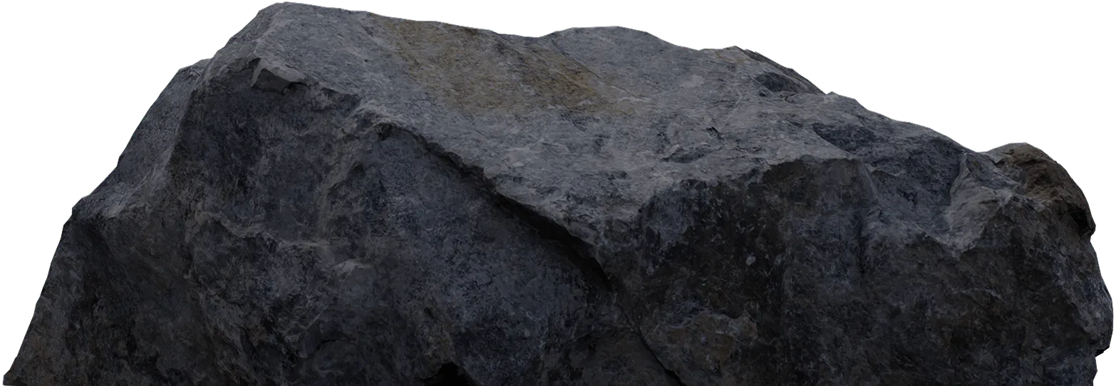 Großer, unregelmäßig geformter, dunkler Felsen mit rauer Oberfläche.