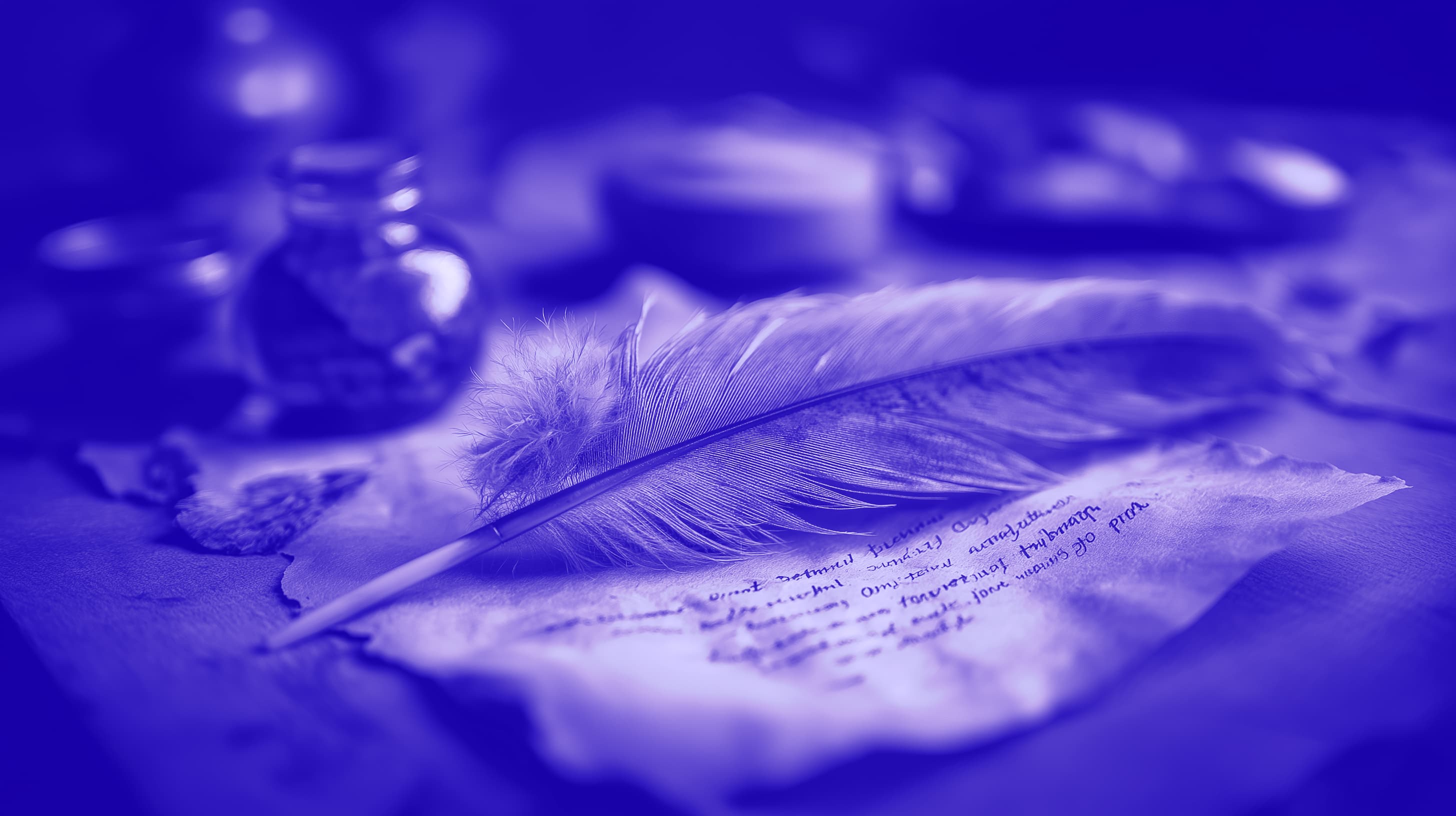 A quill on a piece of parchment