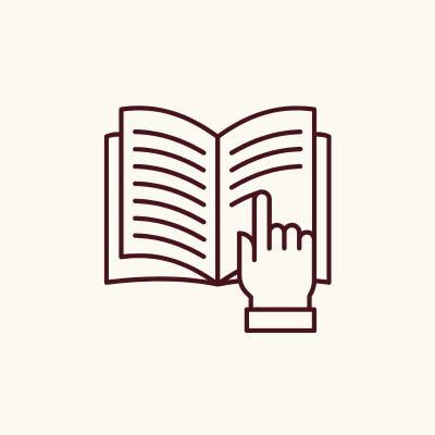 Symbol med bok och hand visar att produkten har mer information du kan läsa om den