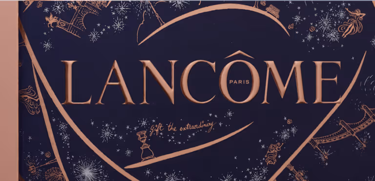 Close up of Lancome holiday packaging zooms in on intricate embossing.