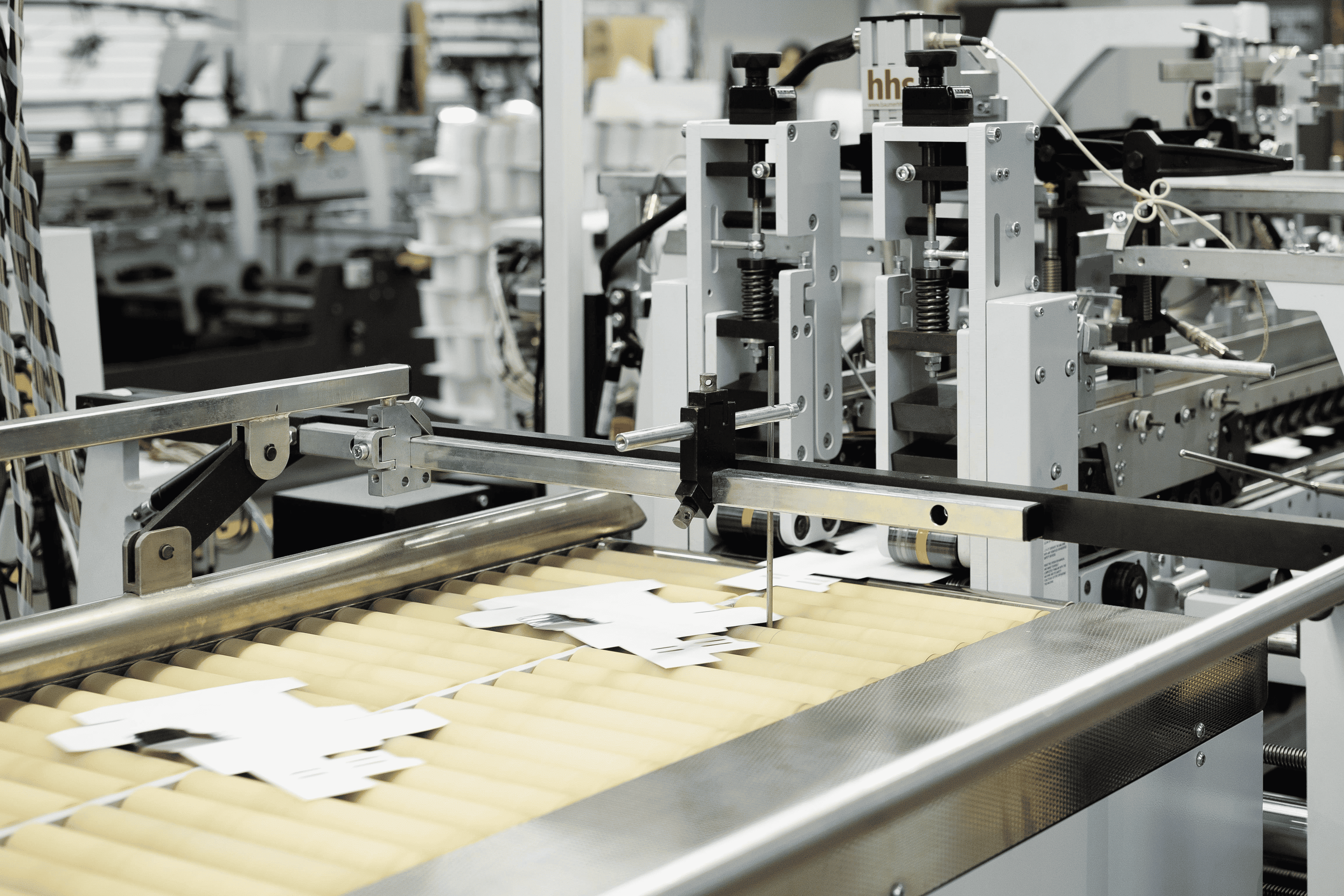 Flatbed die cutting of a folding carton sheet at Arkay Packaging’s Roanoke, VA facility
