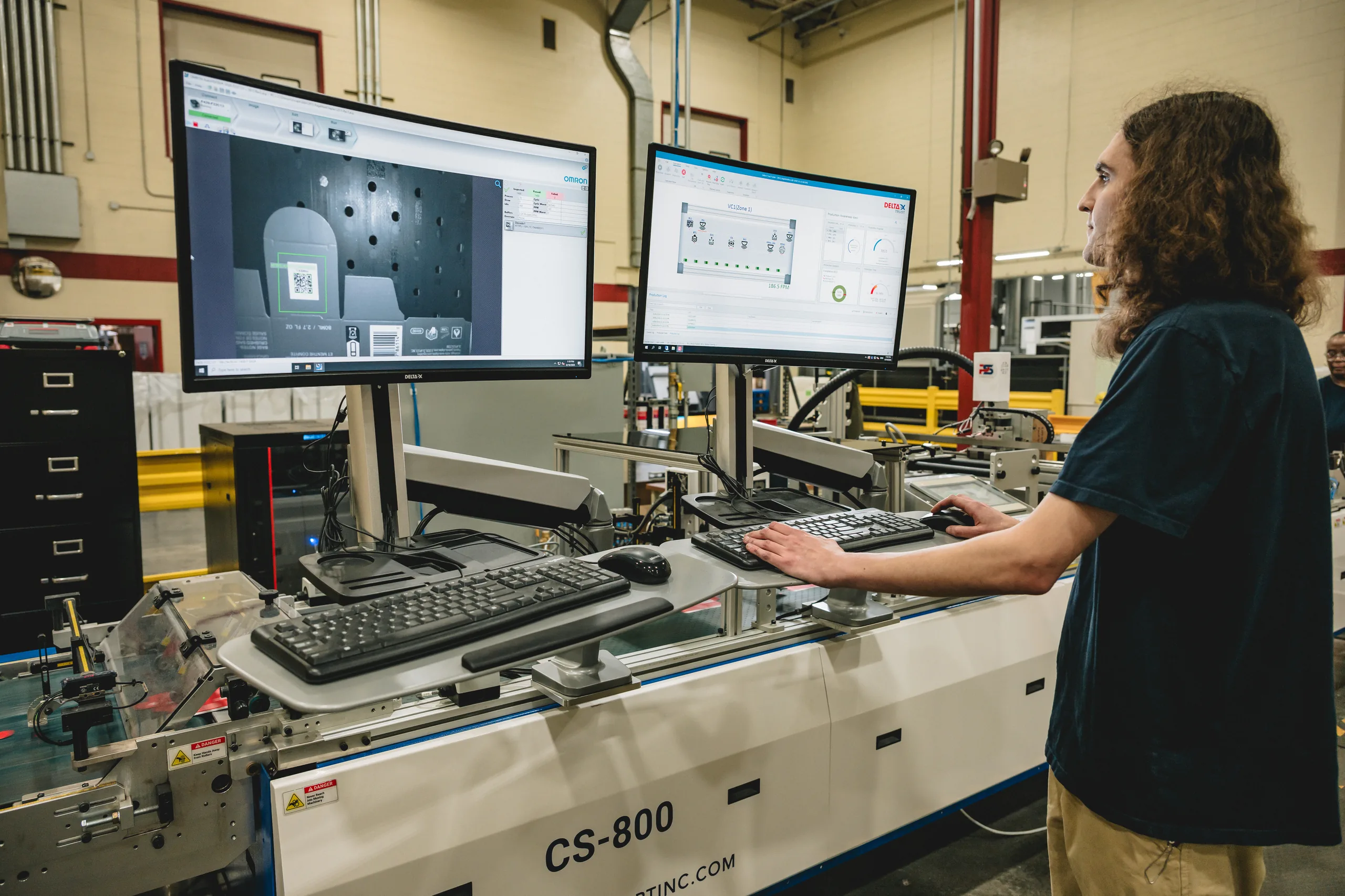 Arkay operator monitoring a connected packaging line with inline vision inspection on the CS-800 system