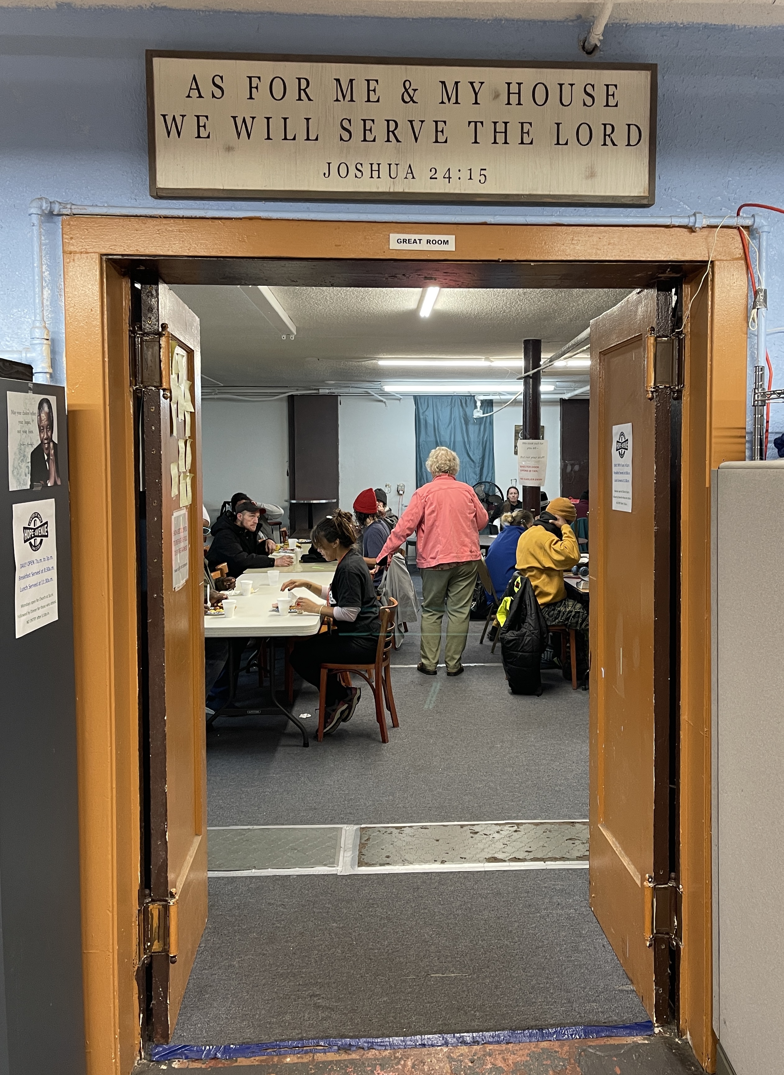 Entryway to communal area, framed by bible verse