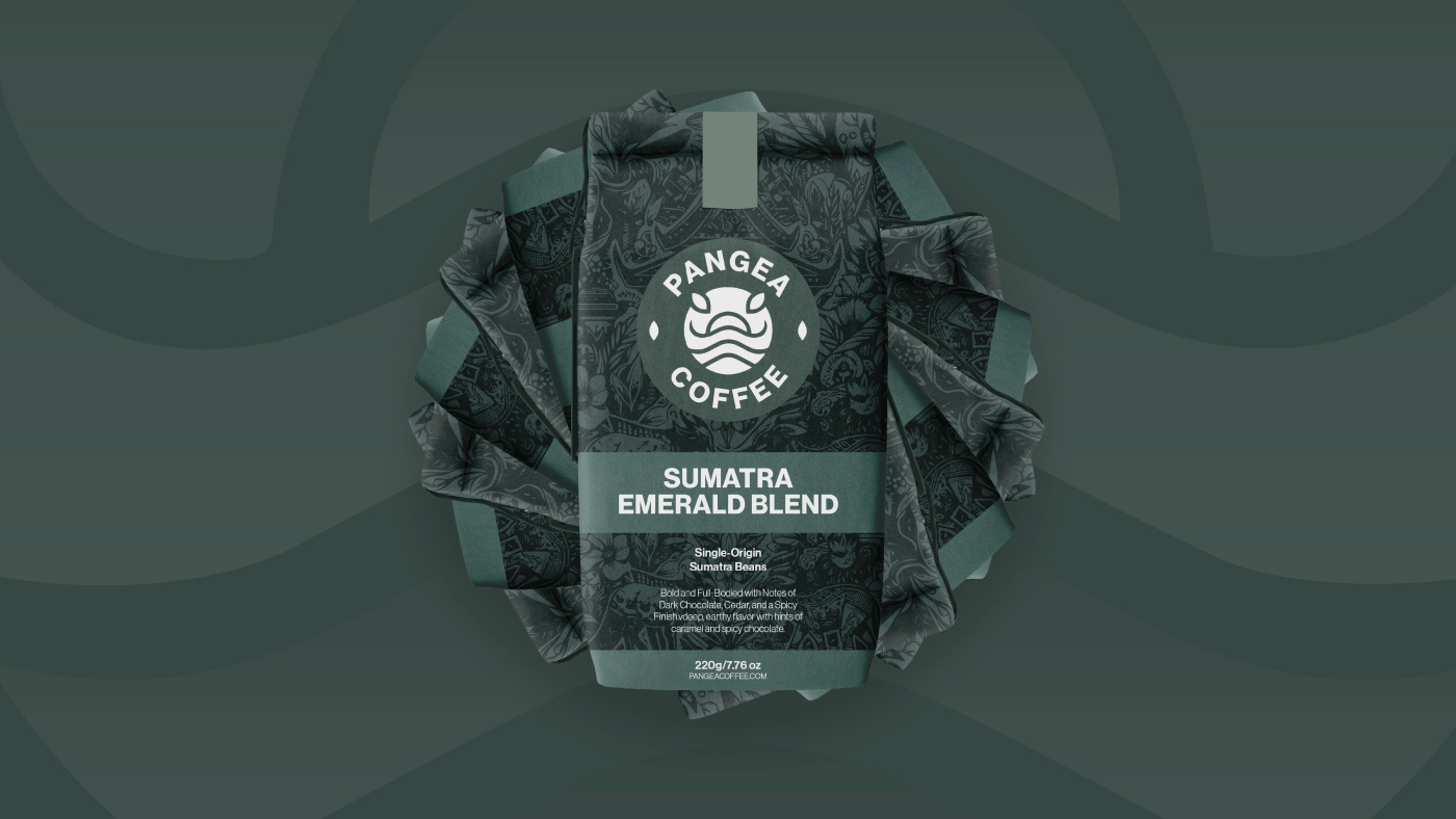 Pangea Coffee branded coffee bag for Sumatra Emerald Blend with detailed patterns and logo on a dark green background.