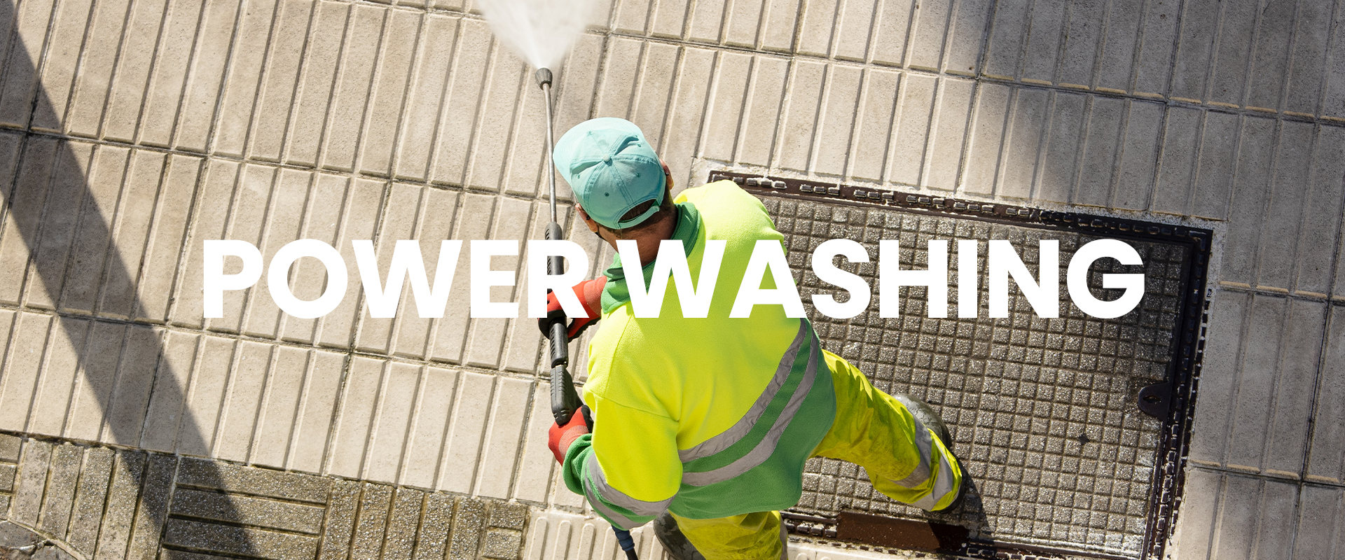 Overhead shot of a power washer washing a surface