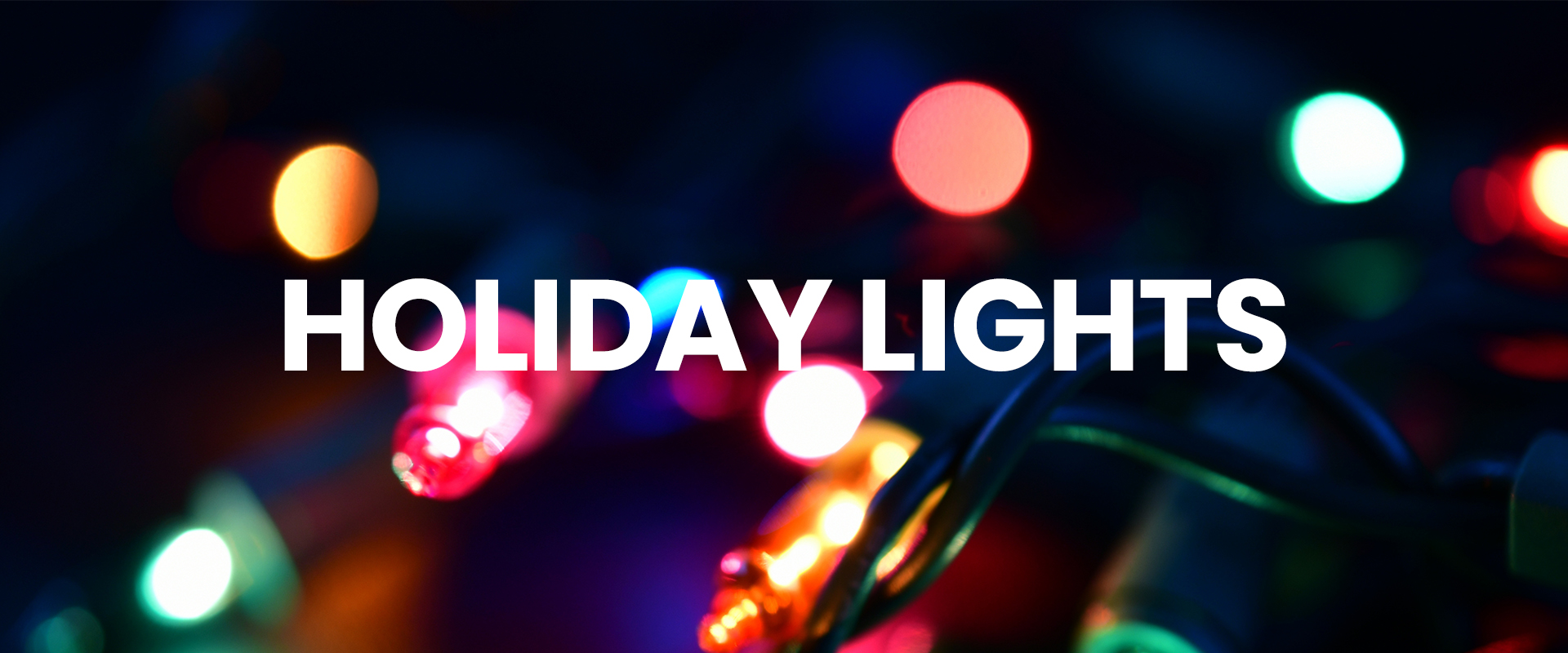 Strand of assorted Christmas light color bulbs