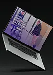 Laptop displaying a website for janitorial management and PAX services with a janitor mopping a floor.