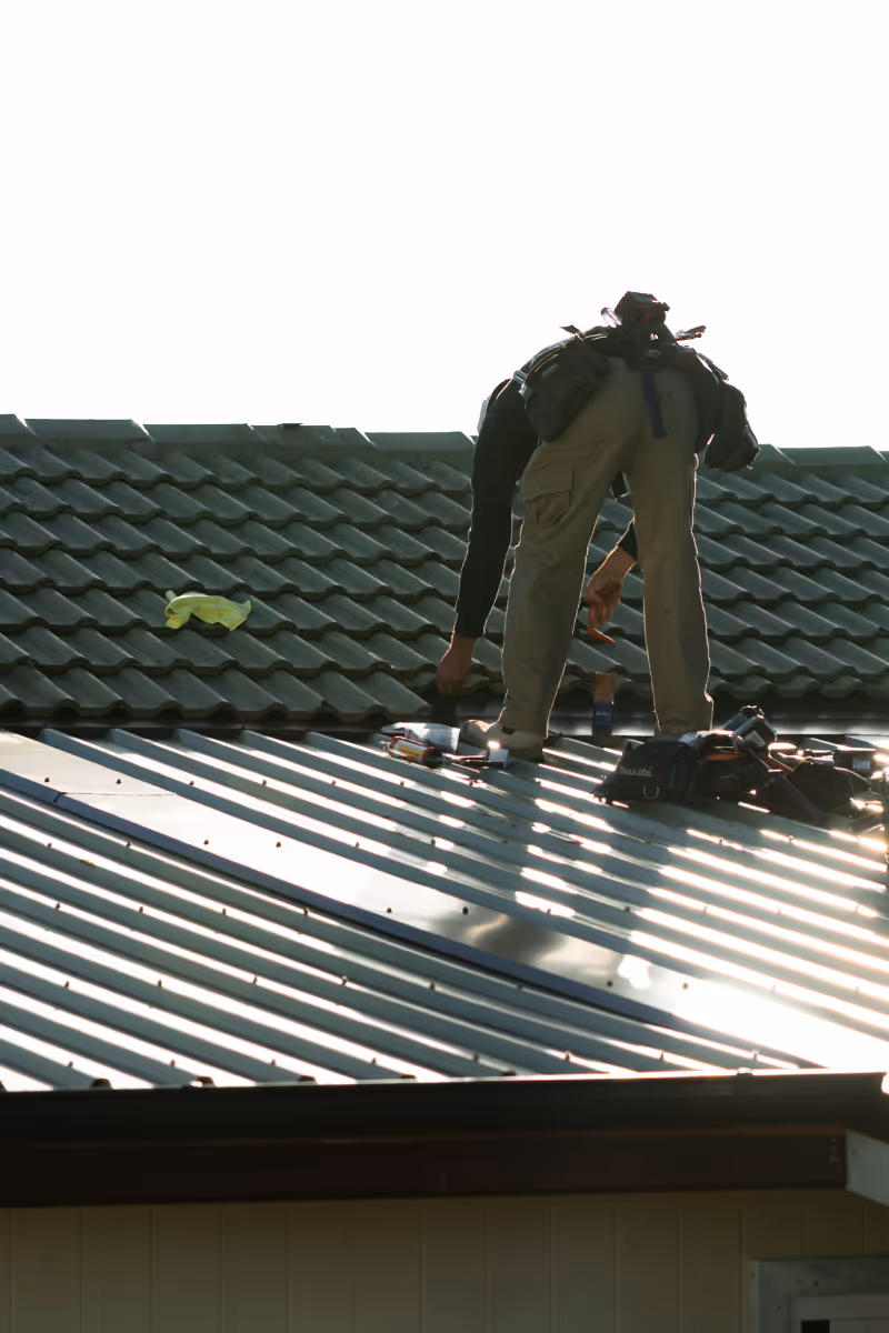 Person working on a roof