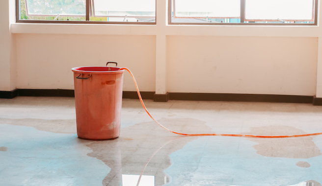 bucket on water filled floor