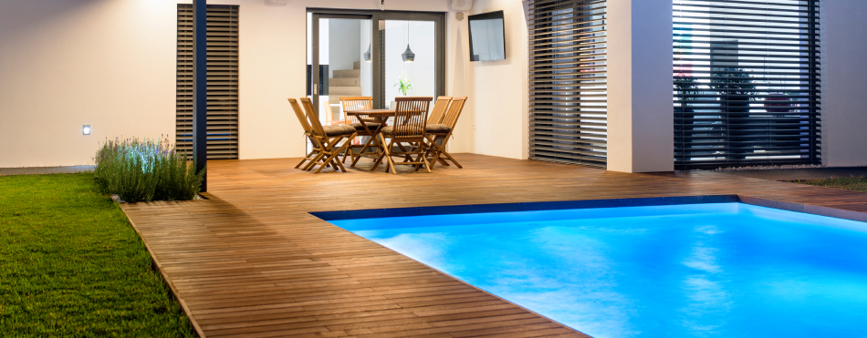 Large wooden back deck with pool area 