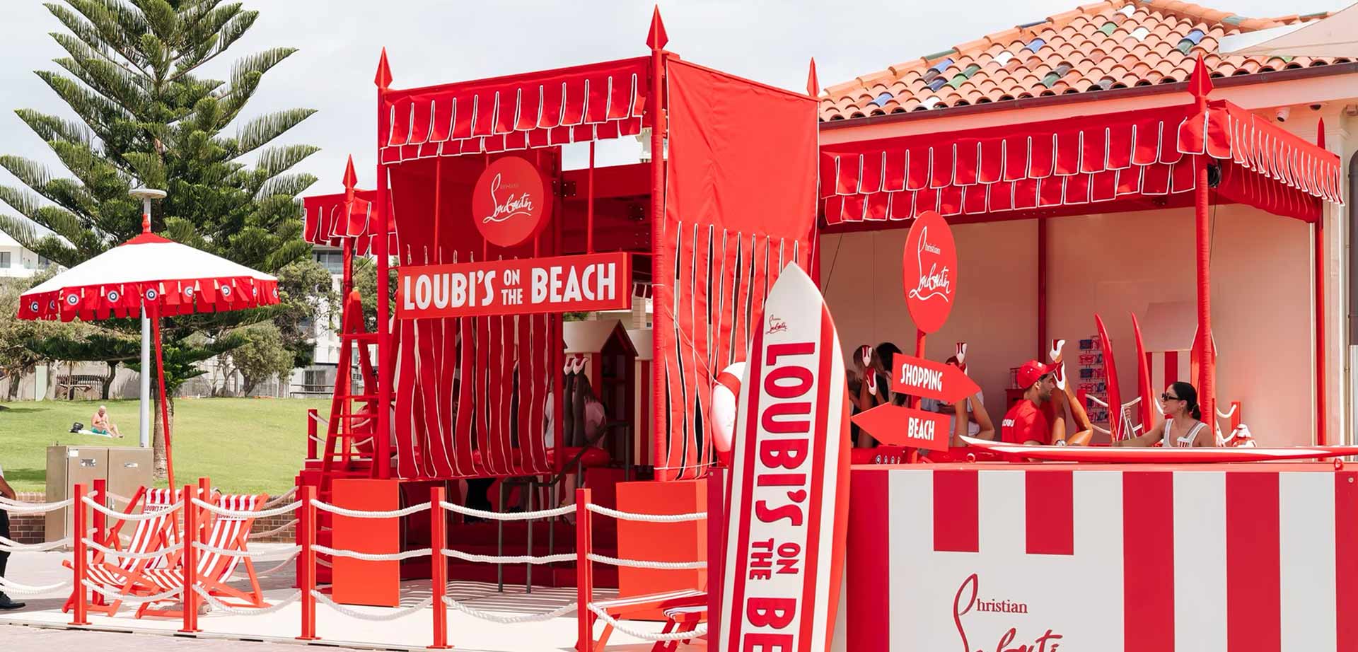 a beach club experiential marketing build on bondi beach for Christian Louboutian shoes in red and white stripes