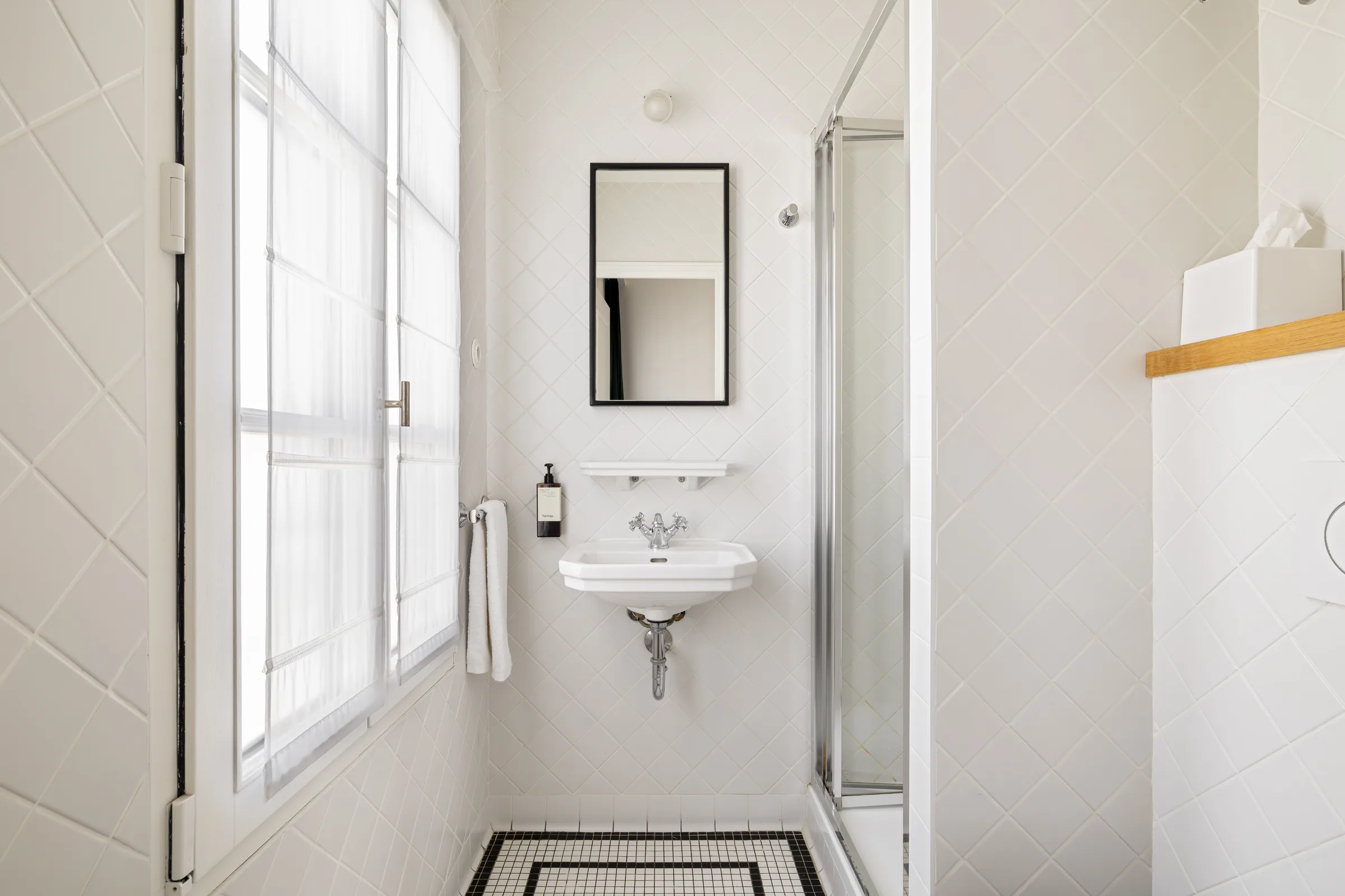 Comfort Room bathroom with white diamond tile shower