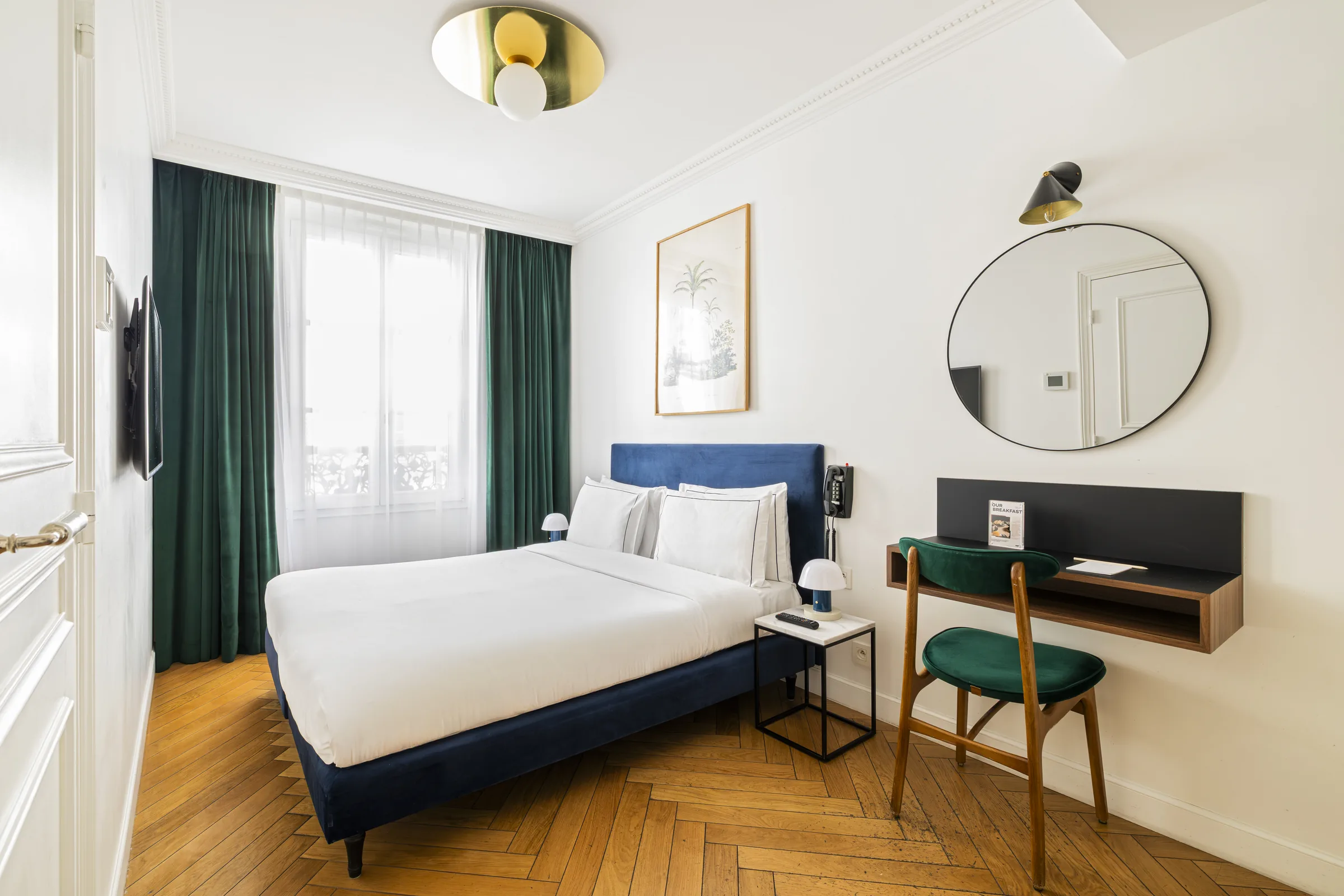 Superior double room with wooden desk and herringbone floor