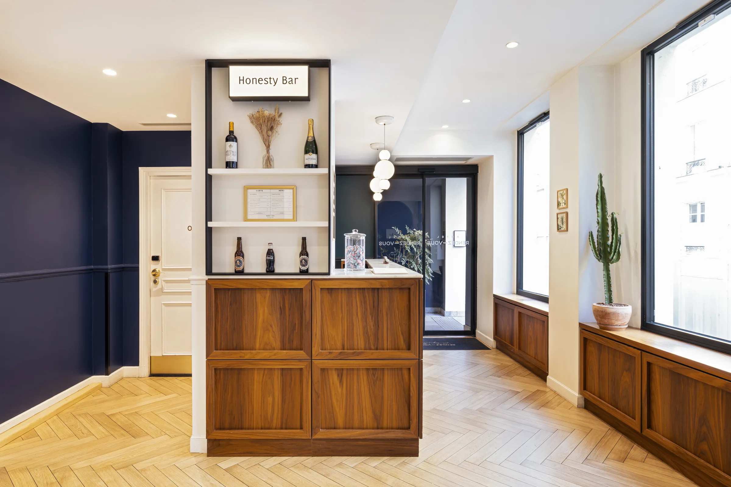 Honesty Bar with wine and beer bottles Batignolles hotel