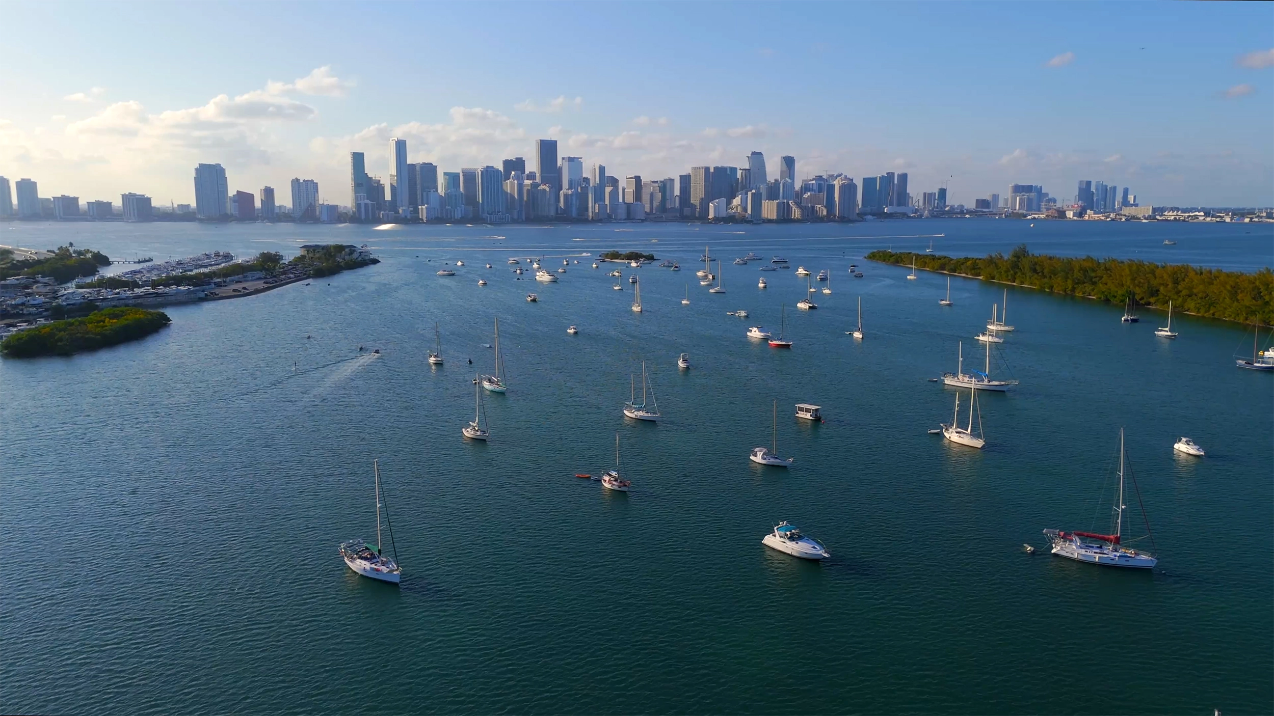 Sunset view of Brickell City Centre and surrounding high-rise buildings in Miami's financial district.