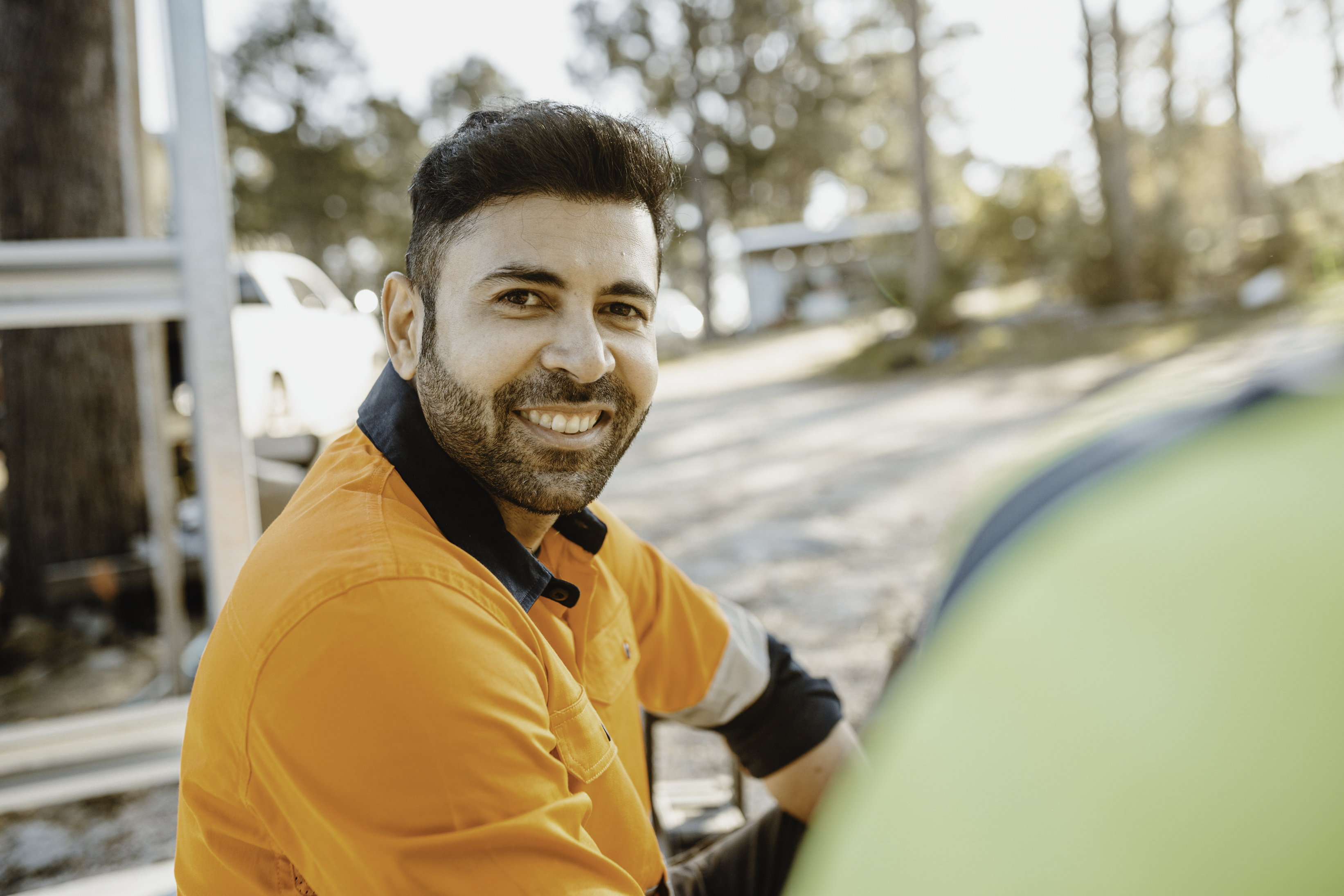 Carpenter building the frame of a house