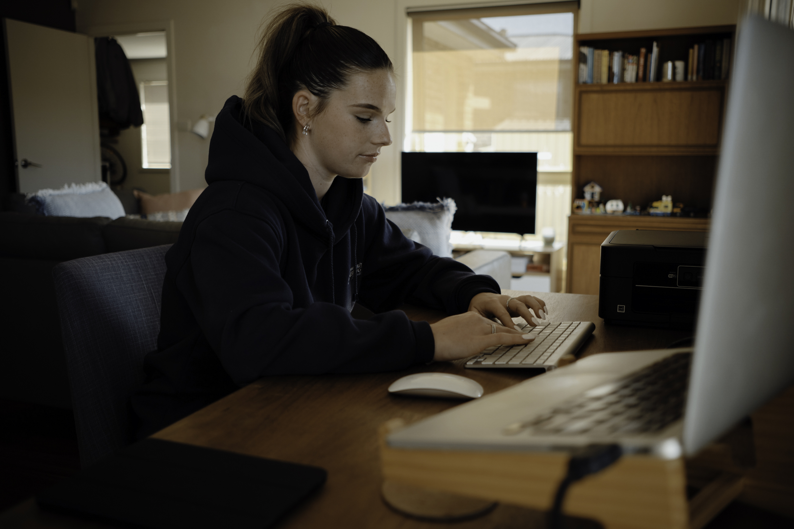 Plumber fixing a hot water cylinder