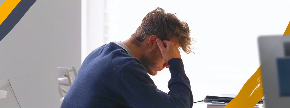 A man thinking hard at work