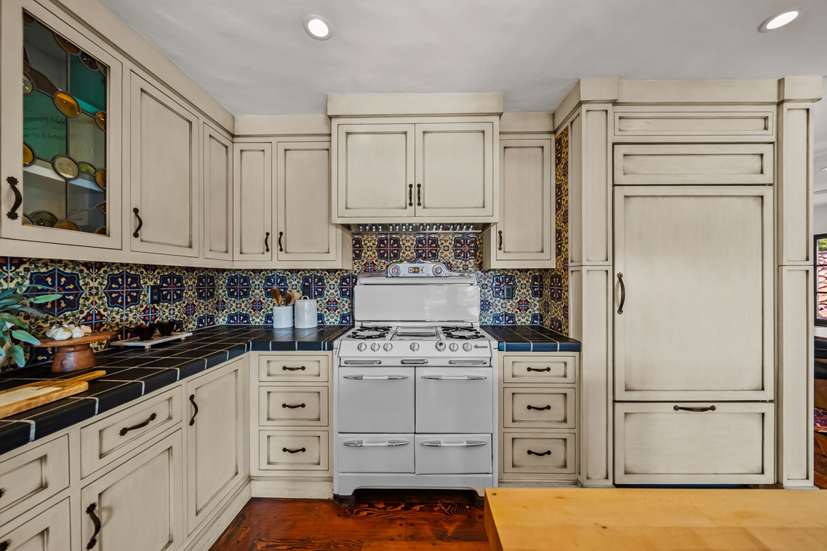 A vintage range anchors the space.