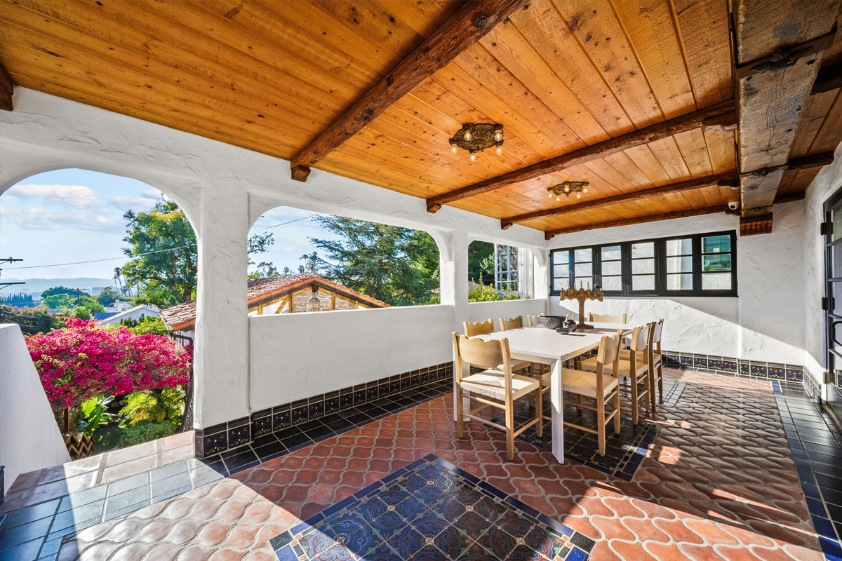 Just outside is a covered dining terrace.