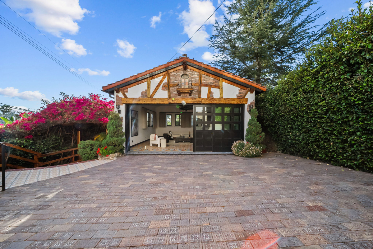 The two-car detached garage has been coverted to flexible living space.