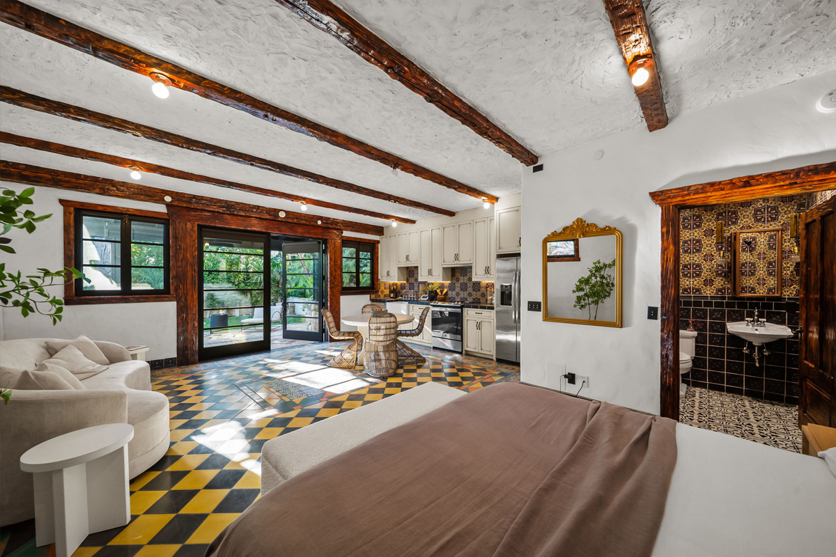 Tucked under the garage is a studio-style guest apartment.