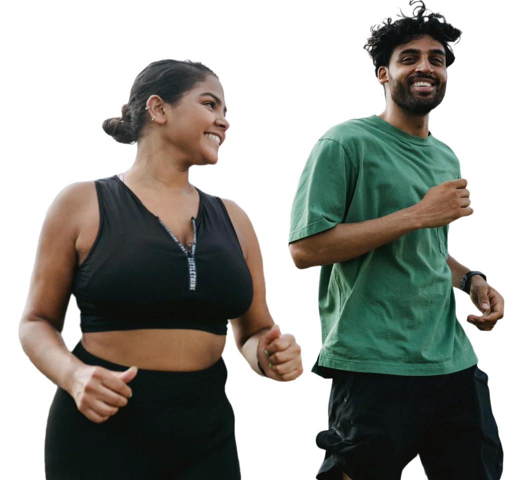 A young couple jogging together.