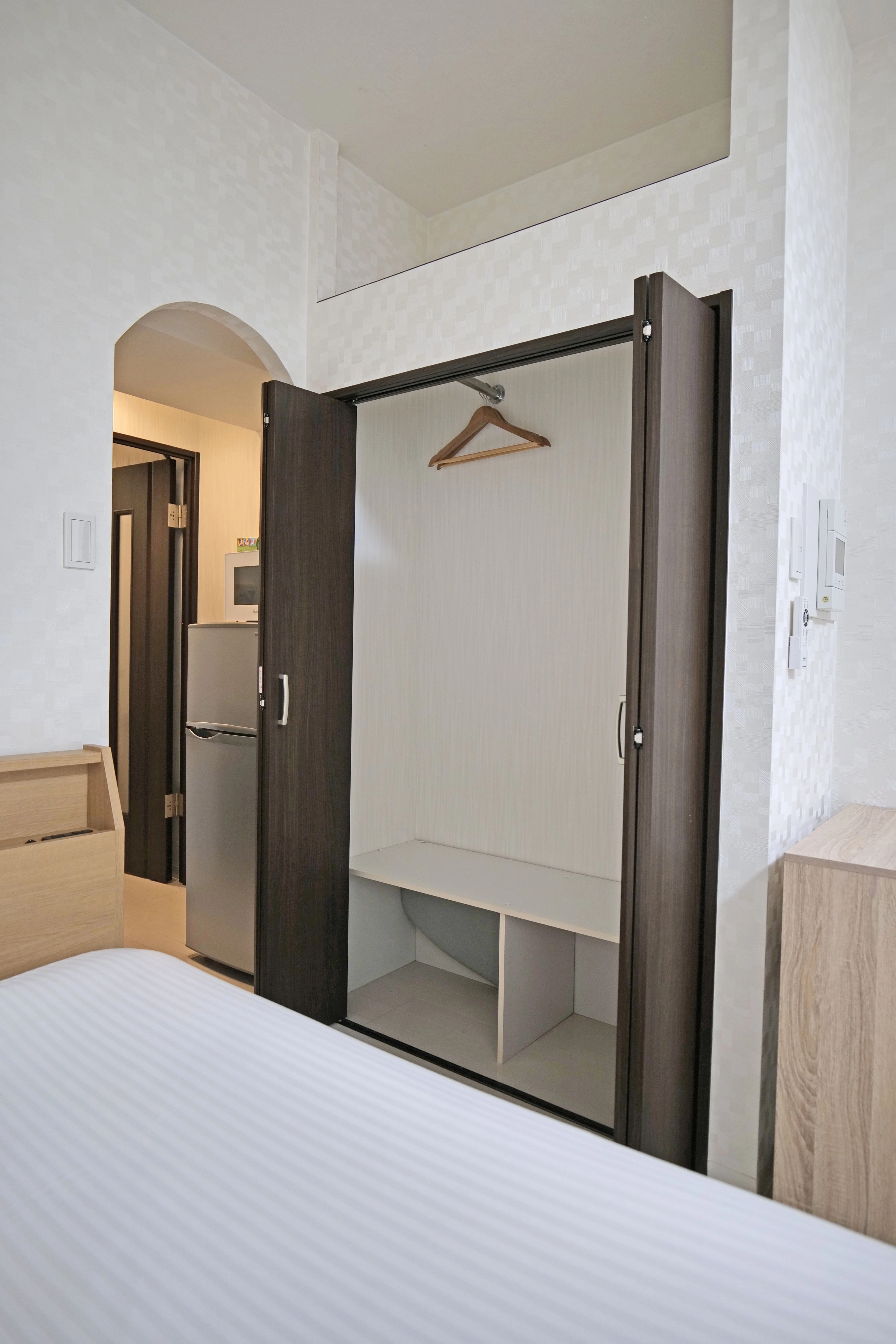 two door functional closet, ideal for organized city living.