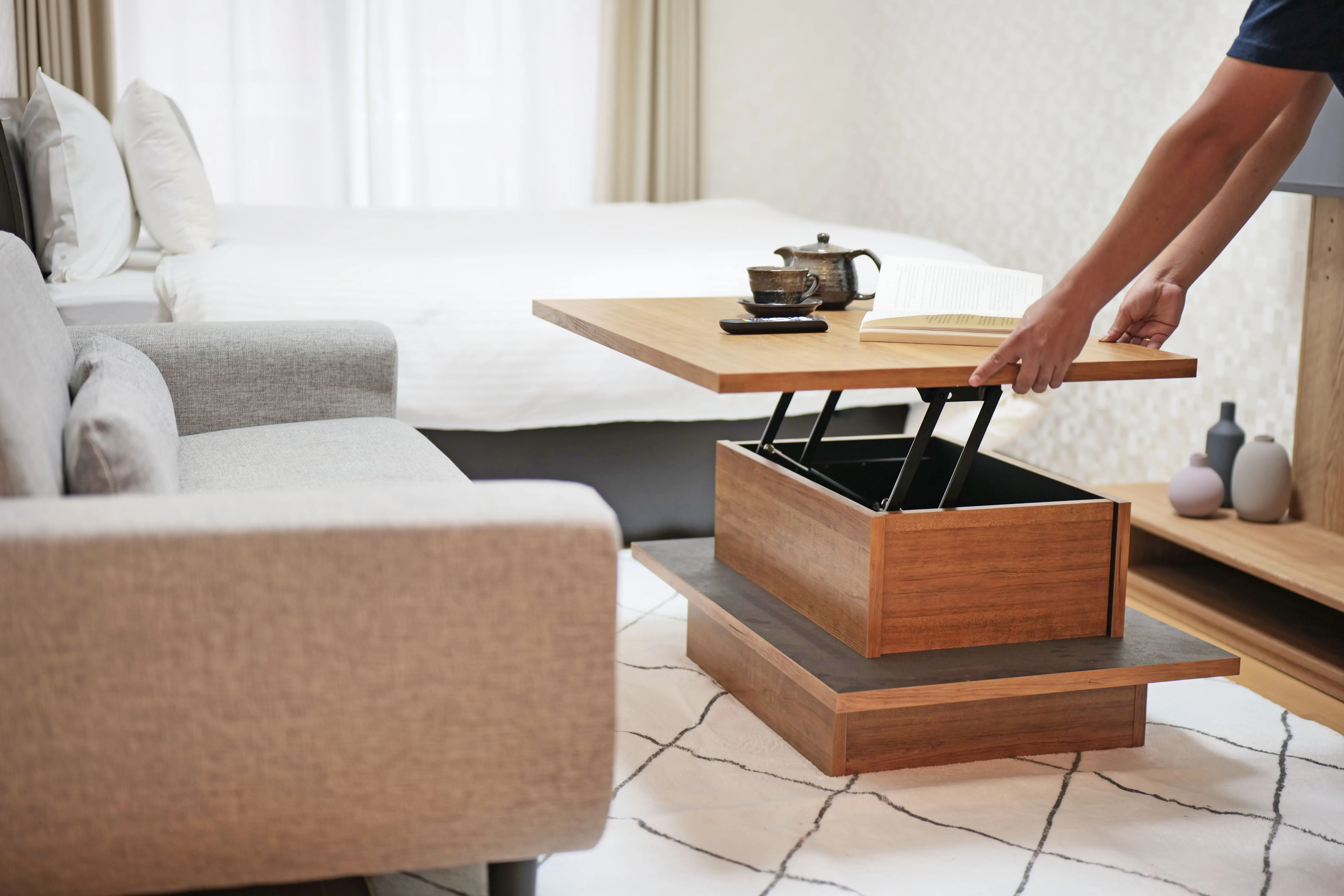 Modern hydraulic lift-top center table with smooth easy-lift mechanism and hidden under storage — perfect for small spaces, living rooms, and multifunctional use. Stylish, practical, and space-saving design.