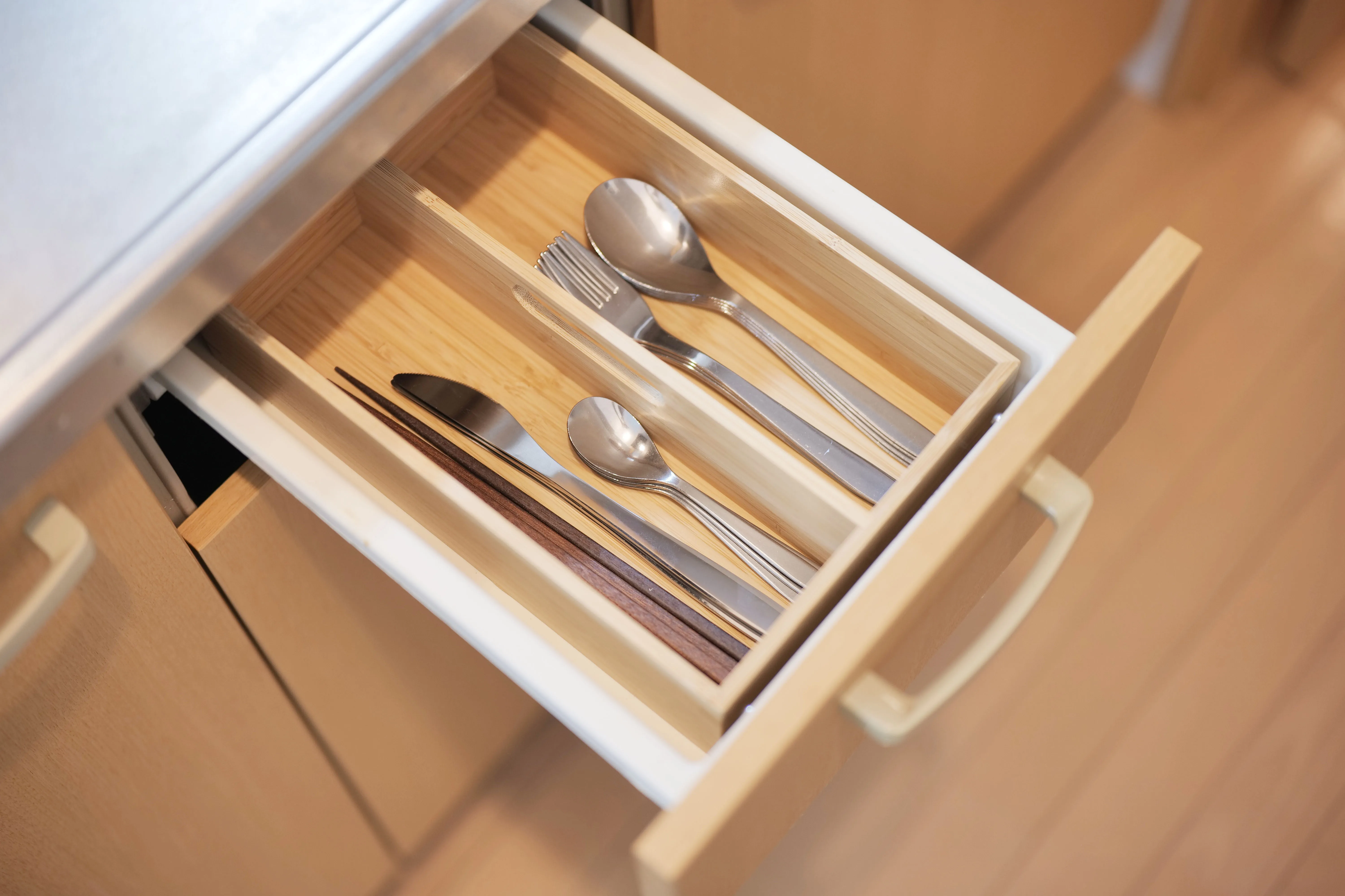 Fully equipped kitchen with complete utensils, cookware, and dining ware — everything you need for home-style cooking and convenient meal preparation.