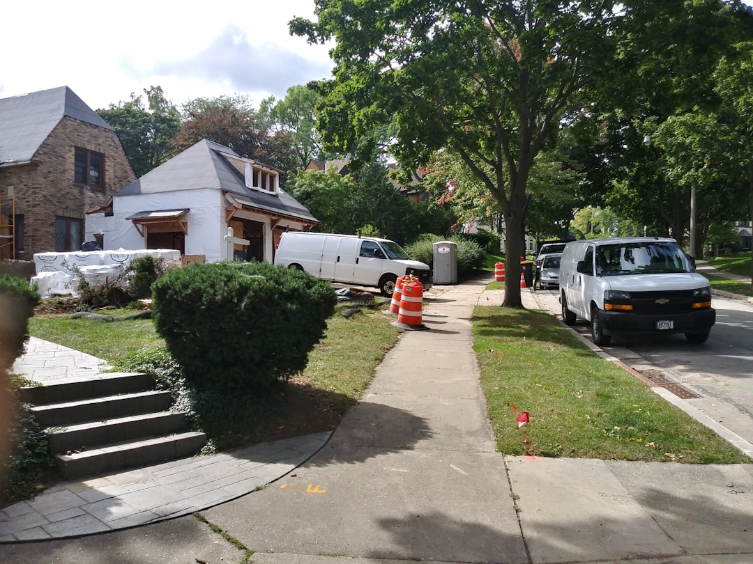 Dispatched home services vehicle arriving at a family home Dispatched home services vehicle arriving at a family home