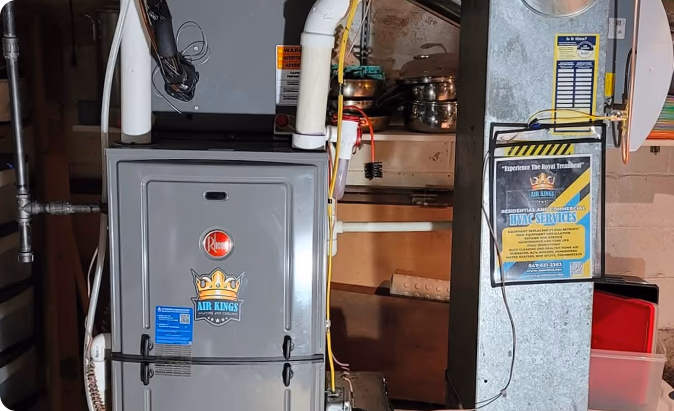 A home furnace unit with a maintenance guide displayed on the right side.