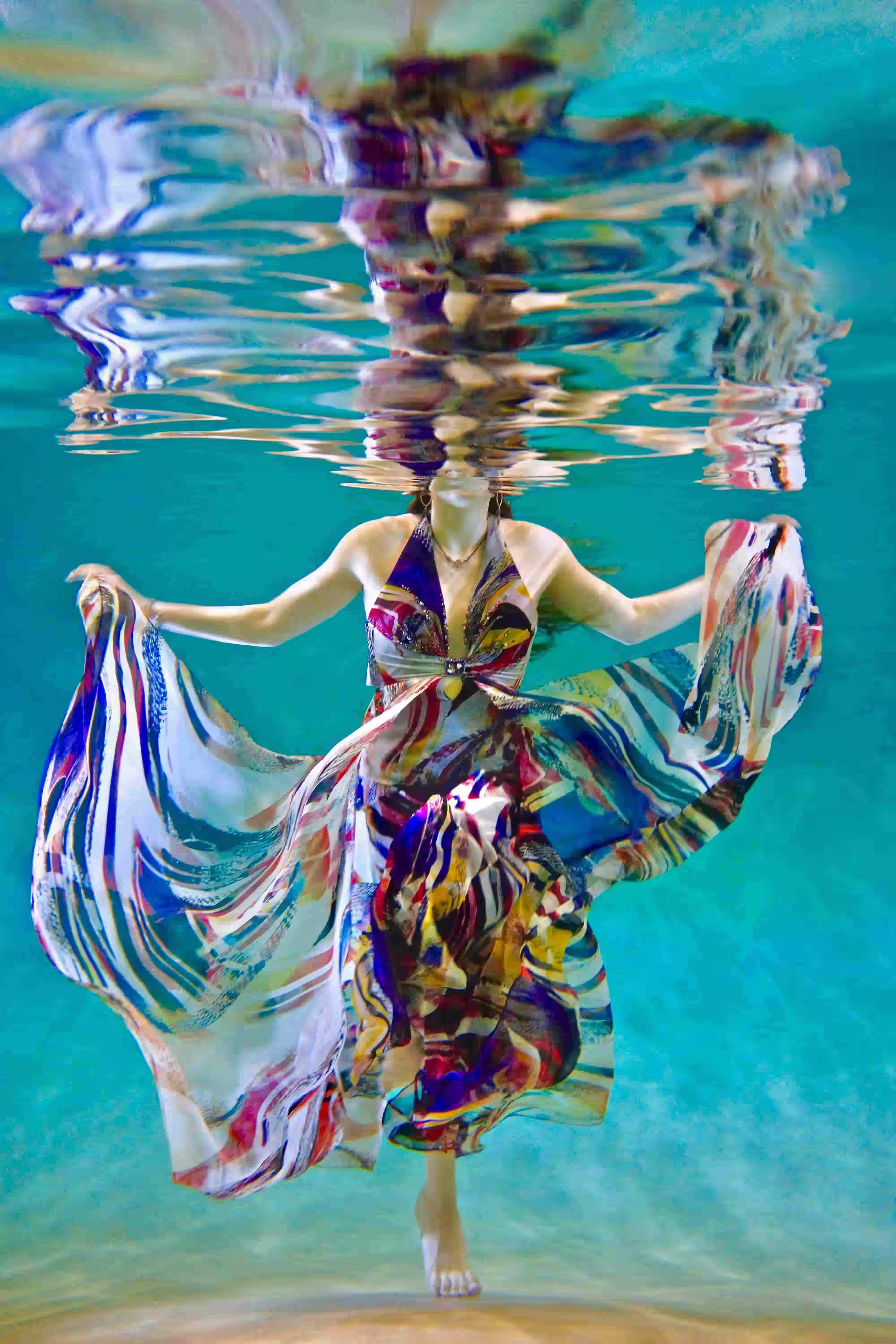 Water.Day_woman in a dress in a pool