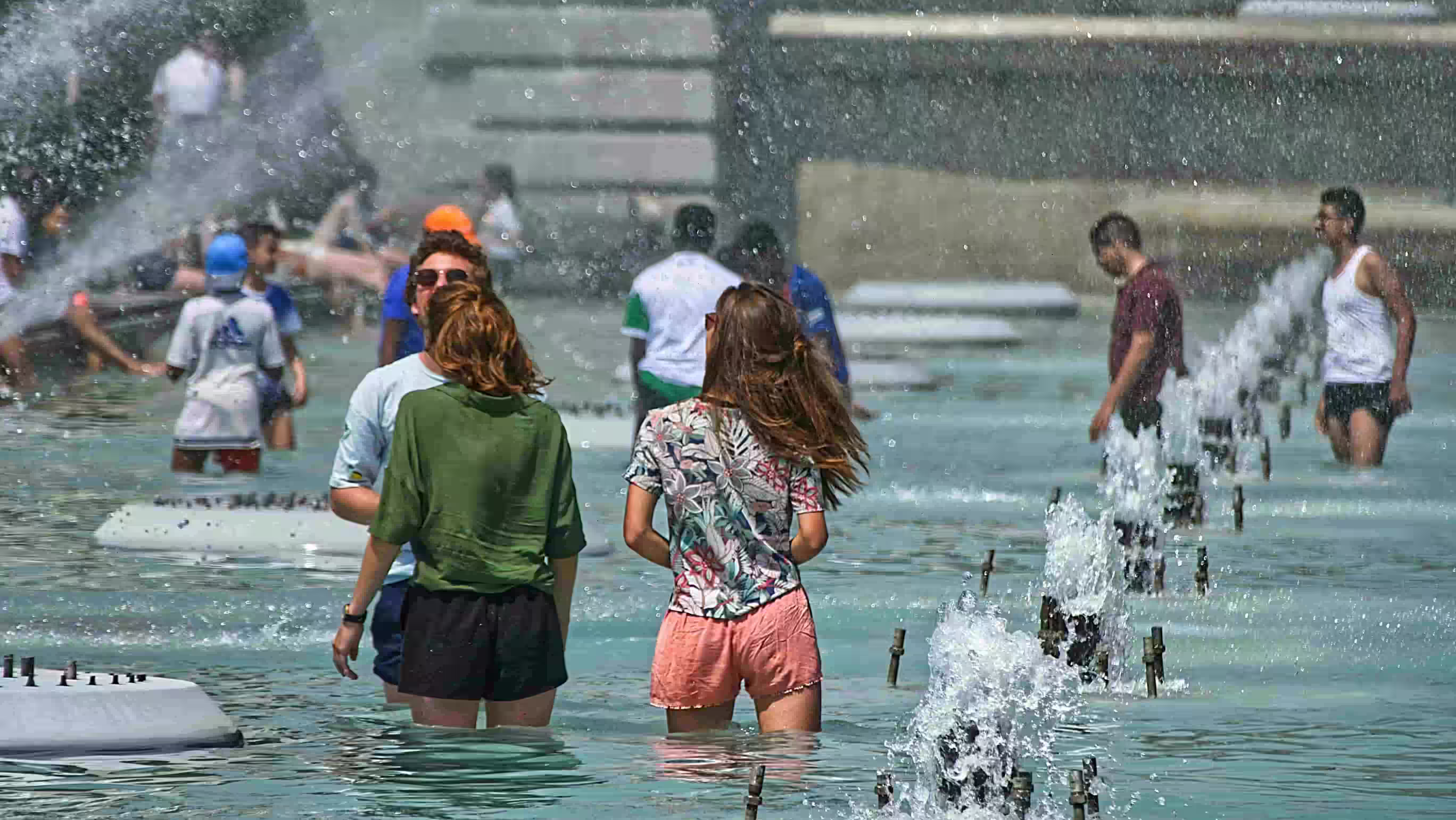 Water.Day_young people standing in the water in Paris