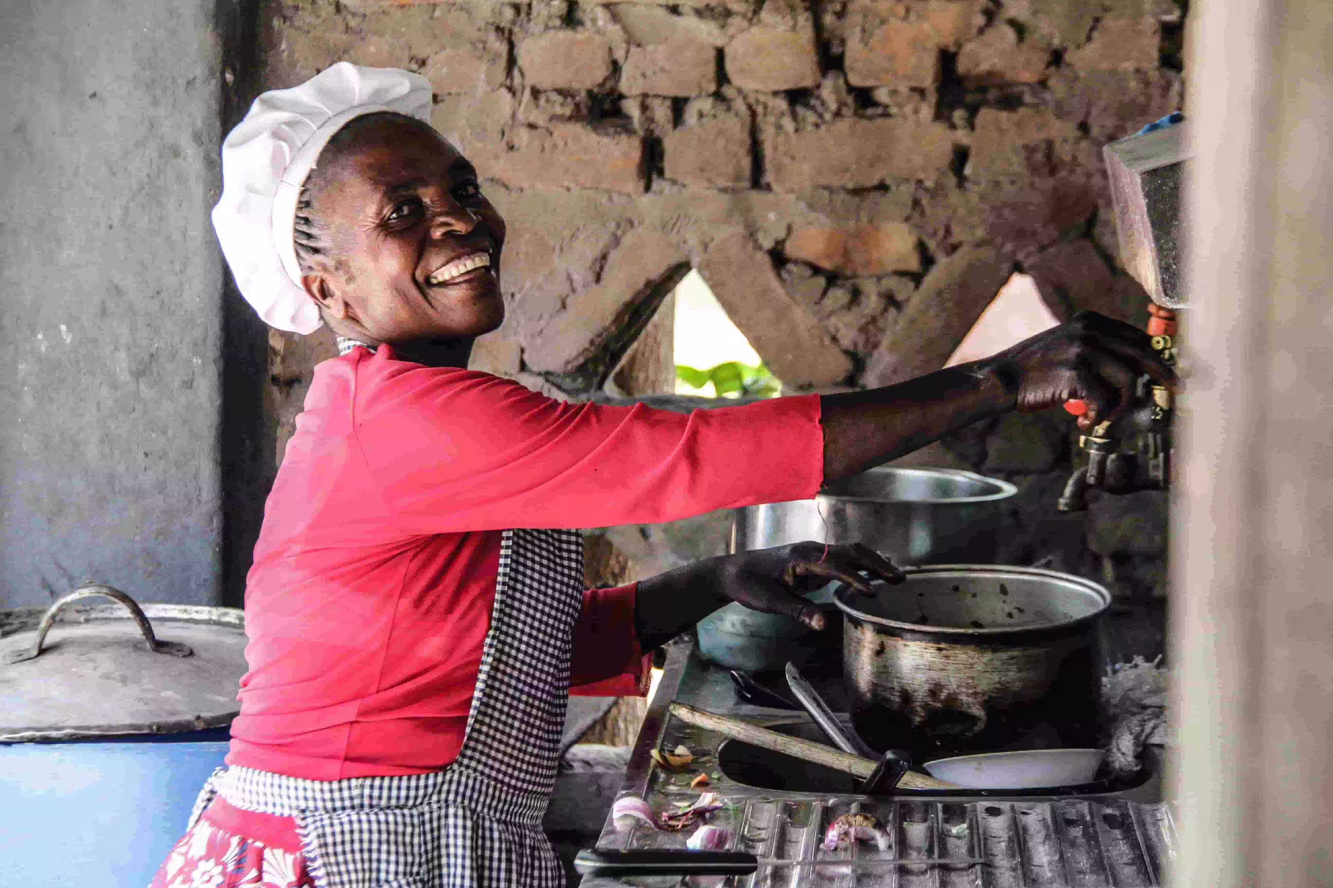 Water.Day_African woman in kitchen