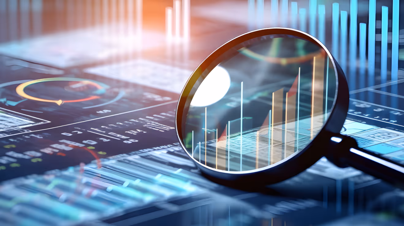 Lupe mit Grafik im Hintergrund