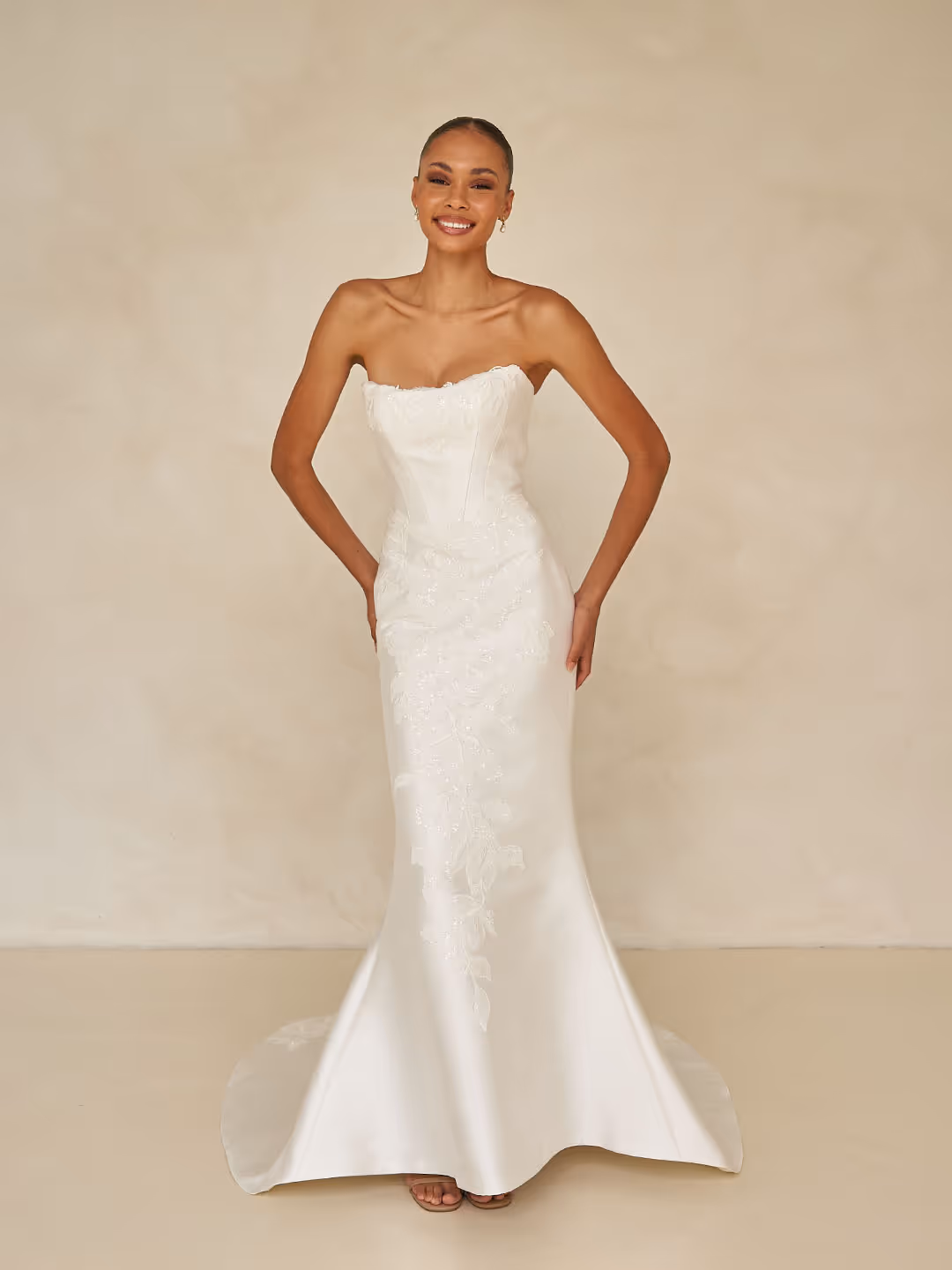 Wedding dress designed by Madi Lane Stocked at Even on a rainy day bridal boutique