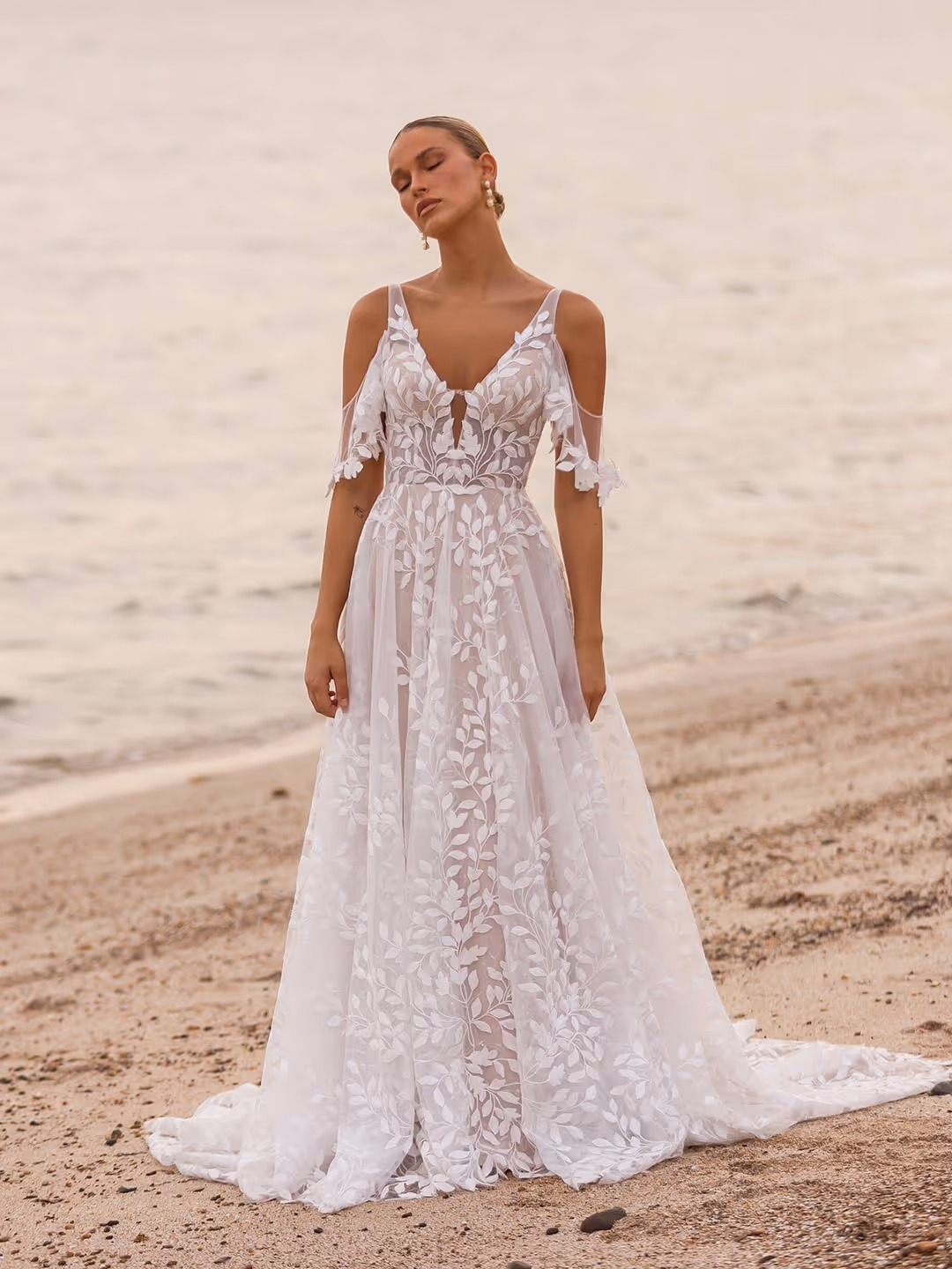 Jaya Wedding Dress by Madi Lane bridal for even on a rainy day bridal boutique