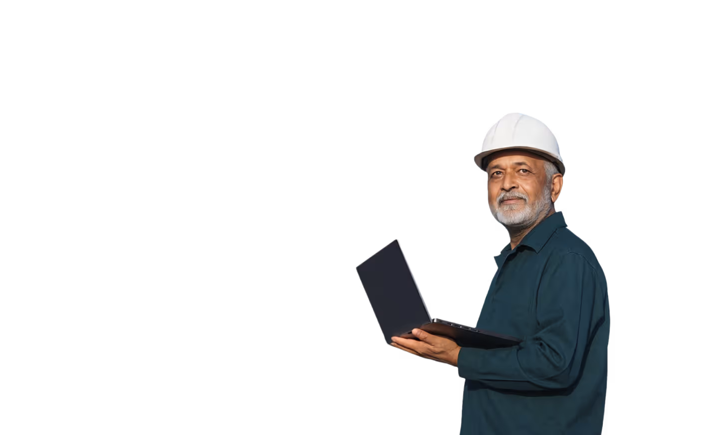 Older man wearing a white hard hat and green shirt holding a laptop and looking at the camera.