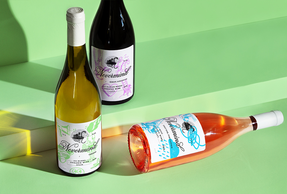 Three wine bottles: white, red and rosé, with expressive and stylish labels